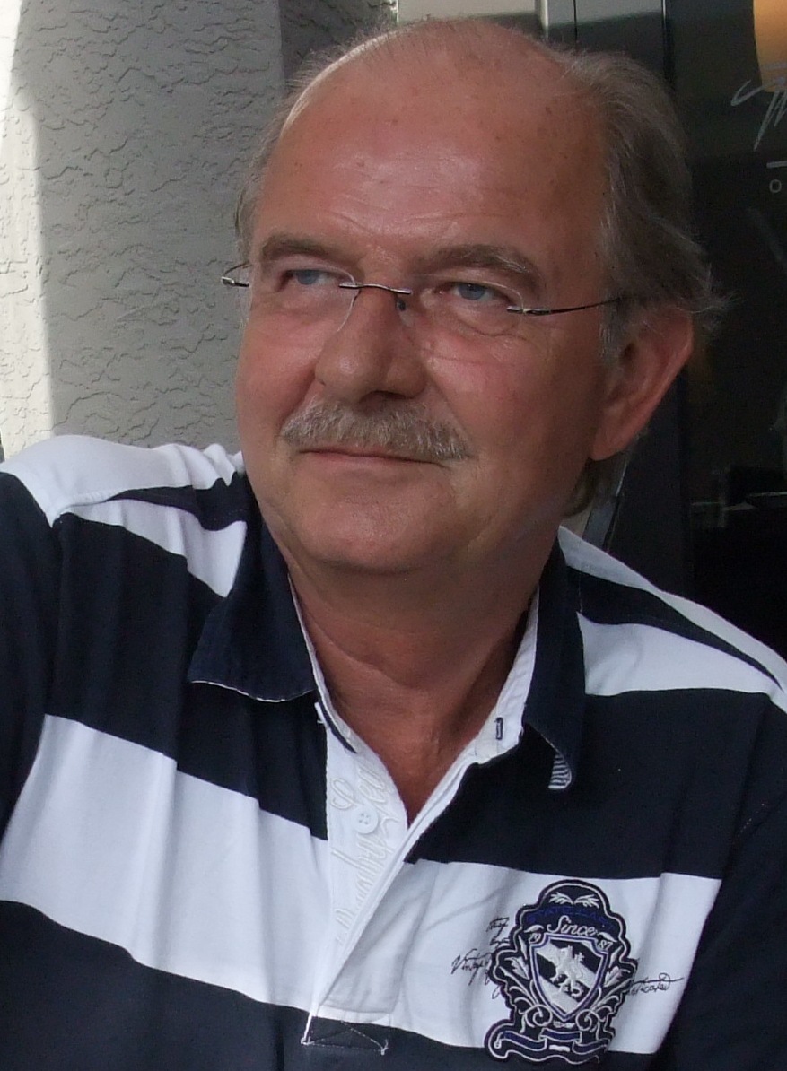 Dr. Kjell E. Løland
