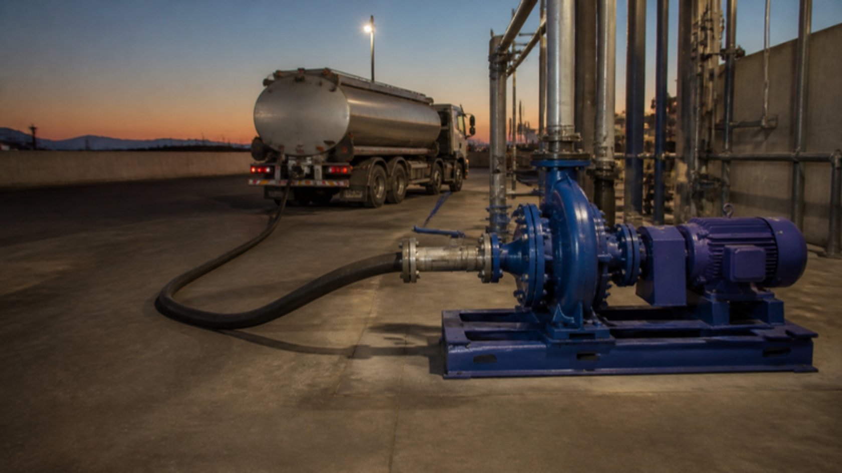 Illustration of a pump unloading fuel from a tanker truck in use