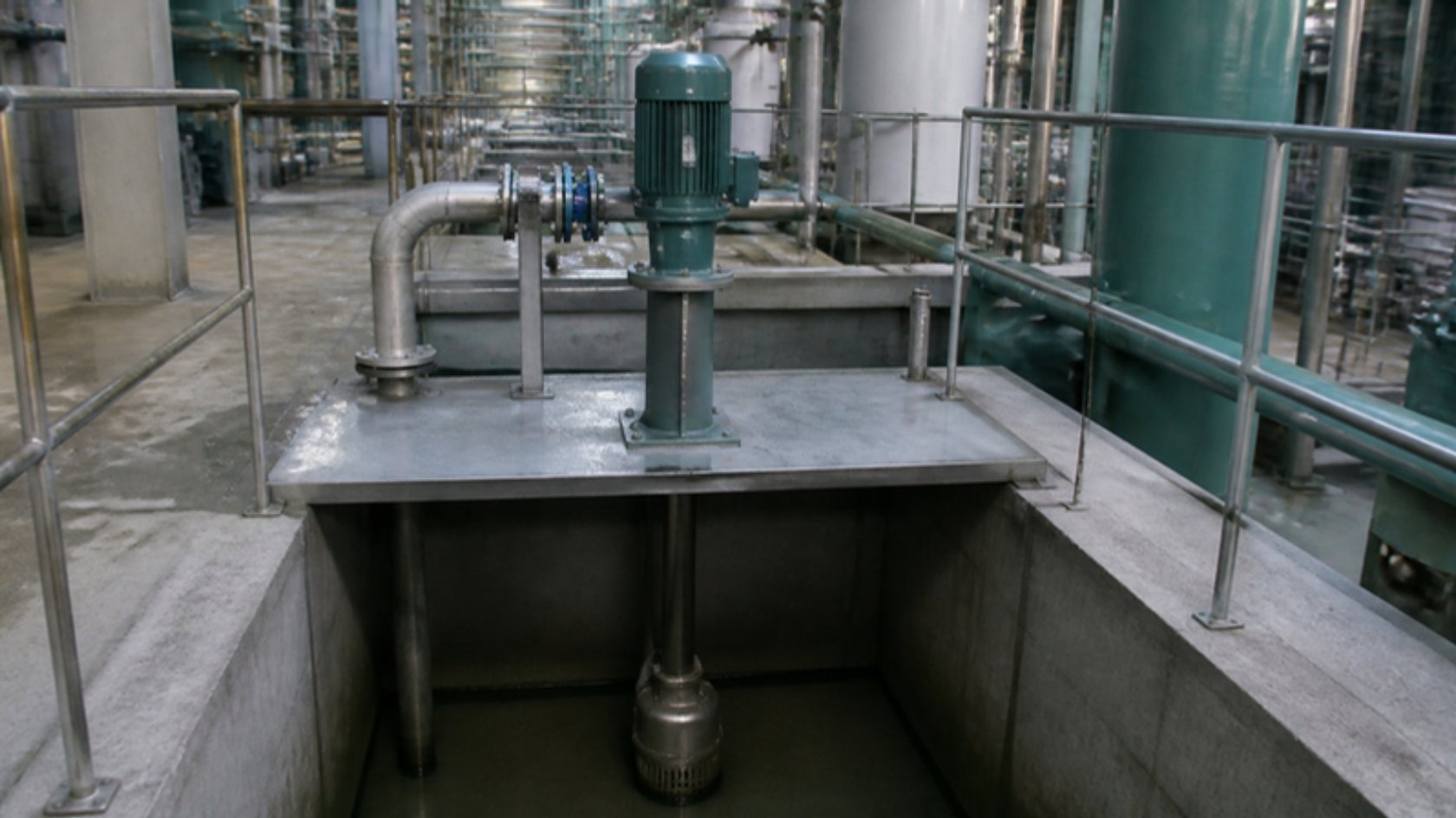 Illustration of a vertical sump pump above a sump pit