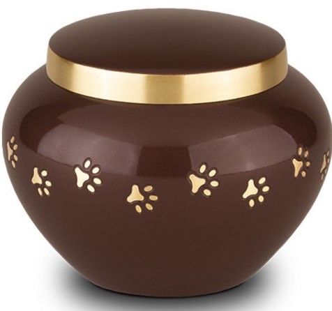 liten brun metall urne med skrulokk og potespor