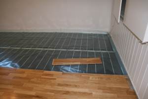 2011 - Nytt gulv med varme i styrerom