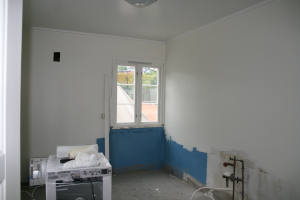 2014 - Oppussing kjøkken. Avretting av gulv og ny innredning.