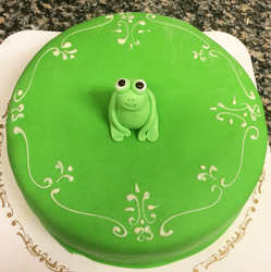 Håndlaget grønn frosk.