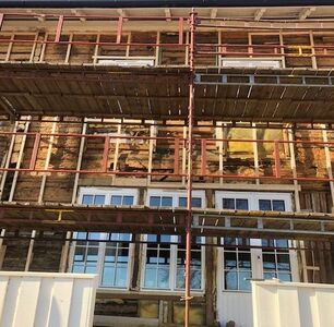 Oppbygging av utlekting for tilleggsisolering av tømmervegg.