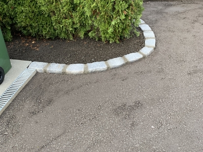 ACO renne og Storgate Stein som kantstein