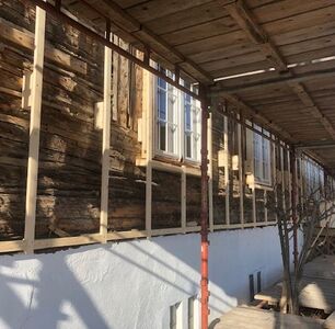 Oppbygging av utlekting for tilleggsisolering av tømmervegg.