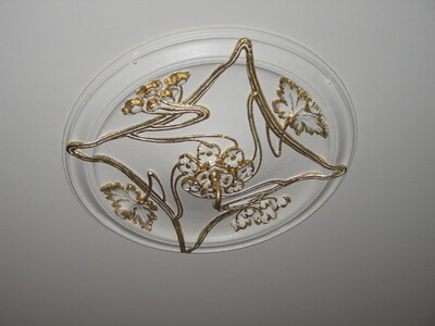 Takrosett i gull (Kongensgt. 12)